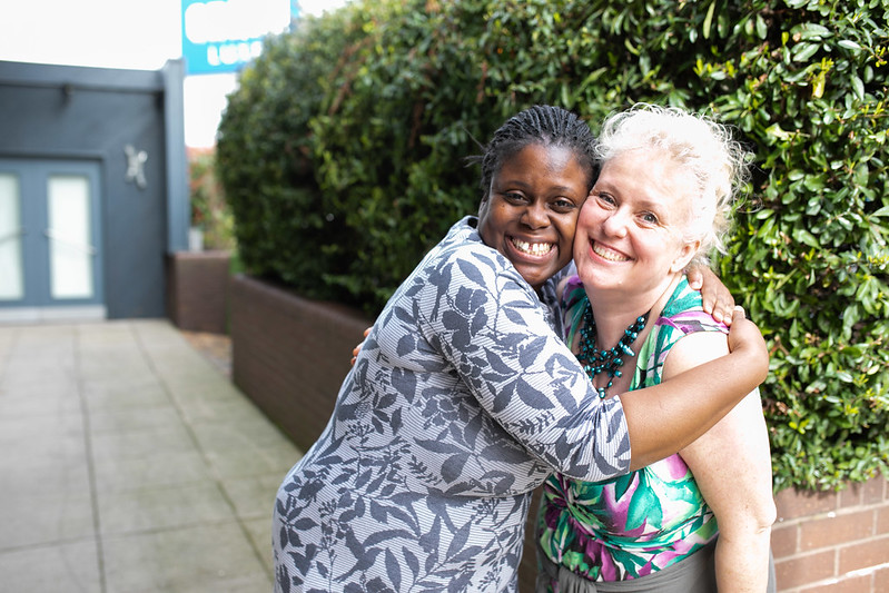 Two women hugging