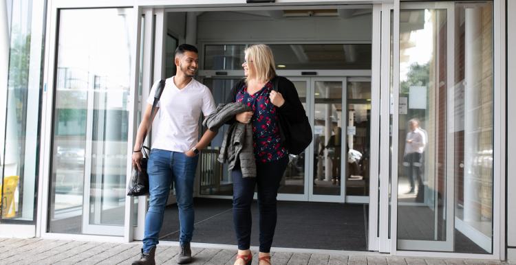 Couple leaving hospital