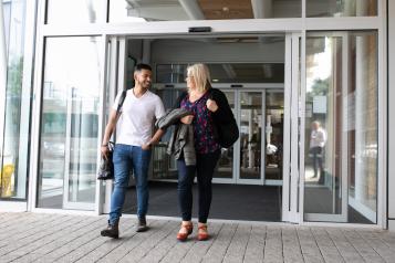 Couple leaving hospital