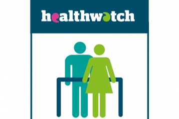 Two figures standing under Healthwatch banner