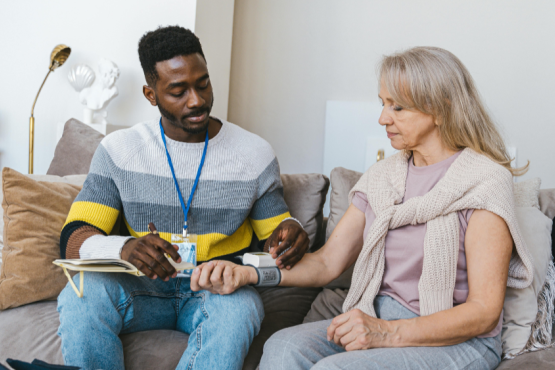a_person_taking_the_vitals_of_a_patient_in_home_setting