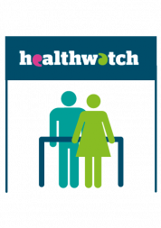 Two figures standing under Healthwatch banner